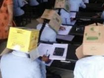 В Индии первокурсников  заставили сдавать письменный экзамен  с картонными коробками на головах